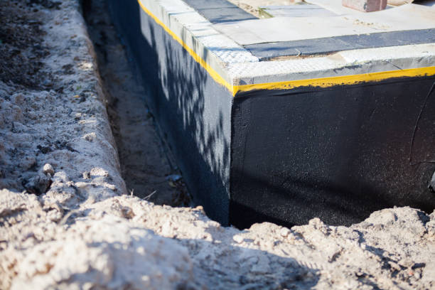 Professional Waterproofing technician working in Carthage, IL